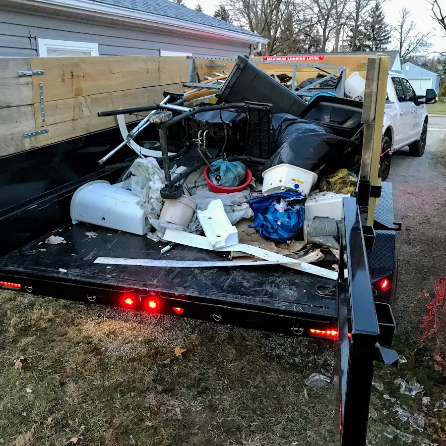 Roll-off dumpster delivered to a residential driveway in Murphy