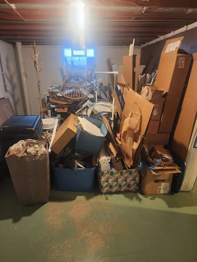 Roll-off dumpster container at job site for 2 Yard Dumpster Rental in Murphy